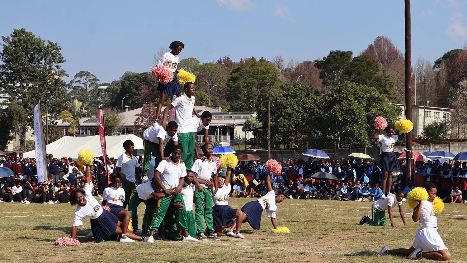 Somnjalose High School form a pyramid while performing in their Cheer category.
